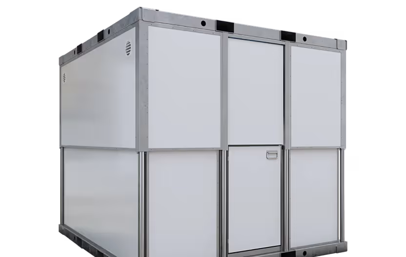 White modular steel container unit with a closed door and ventilation vents on a corner.